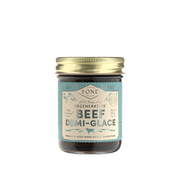 FOND Beef Demi-Glace in glass jar with gold lid, featuring a label highlighting regenerative grass-fed beef, organic aromatics, perfect for enhancing culinary creations.