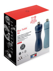 Peugeot | Tahiti Duo Salt + Pepper Mills, Air set in blue shades, showcasing the packaging with Peugeot logo, timeline, and lifetime warranty icon, highlighting French craftsmanship.