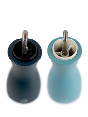Peugeot | Tahiti Duo Salt + Pepper Mills, Air, showcasing exposed grinding mechanisms in dark blue and light teal, embodying a classic shape with contemporary colors.