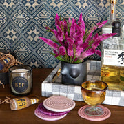 St. Frank | Iridescent Amber Collection - Pitcher, handblown in Hidalgo, showcased on a table with coasters, embodying artisanal Mexican glassware craftsmanship.