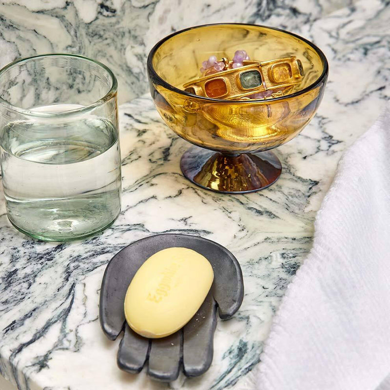 St. Frank | Iridescent Amber Collection - Pitcher on a marble surface, showcasing handblown craftsmanship from Hidalgo, Mexico, emphasizing unique design and artisanal heritage.