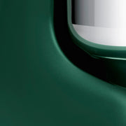 Close-up of the Ankarsrum Stand Mixer, showcasing its sleek green metallic frame and glass edge, embodying robust functionality for versatile baking tasks.