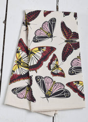 Hearth and Harrow - Butterfly Tea Towel, organic cotton, features stylized butterfly prints, ideal for a natural kitchen setting. Eco-friendly, washable, with a convenient hanging loop.