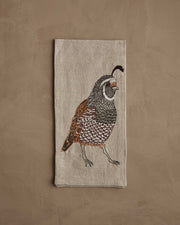Coral & Tusk - Quail Tea Towel, featuring a detailed quail embroidery with intricate feather patterns, suitable for elegant table settings at Athens Cooks.