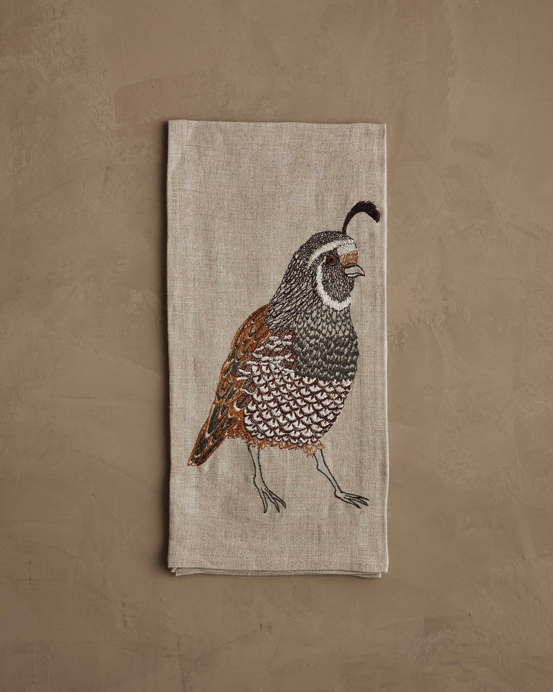 Coral & Tusk - Quail Tea Towel, featuring a detailed quail embroidery with intricate feather patterns, suitable for elegant table settings at Athens Cooks.