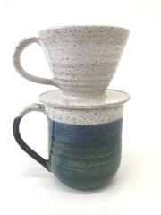 RachaelPots Coffee Pour Over Cone with Handle on a matching stoneware mug; artisan-crafted, speckled design, hand-thrown in Brooklyn, microwave and dishwasher safe.