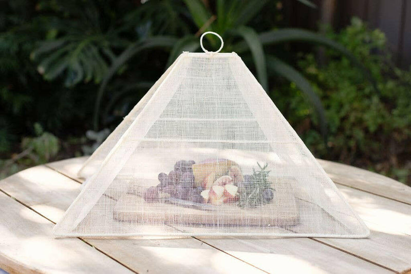 NEEPA HUT | Collapsible Woven Food Tent - Rose Pink, elegantly covers food, showcasing a unique pentagon shape, perfect for stylish outdoor dining and supporting Filipino artisans.