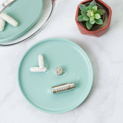 MABLE - Silk Dental Floss Refill - 2 Pack with canister, extra refills, and succulent on a mint-green tray. Eco-friendly and compostable dental care solution.