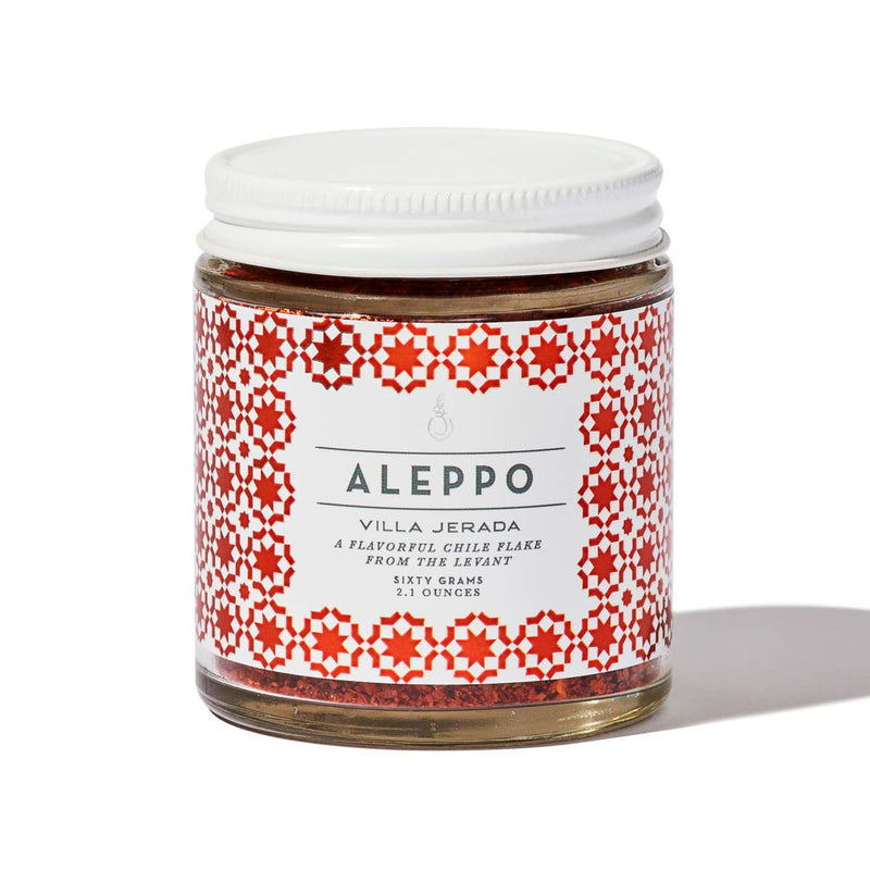 Villa Jerada - Aleppo - 60g chile flakes in a glass jar with a mosaic-patterned label, showcasing deep red pepper flakes for diverse culinary use.