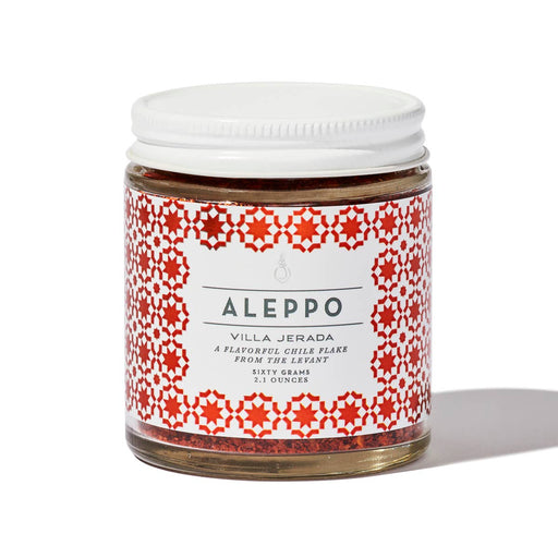 Villa Jerada - Aleppo - 60g chile flakes in a glass jar with a mosaic-patterned label, showcasing deep red pepper flakes for diverse culinary use.