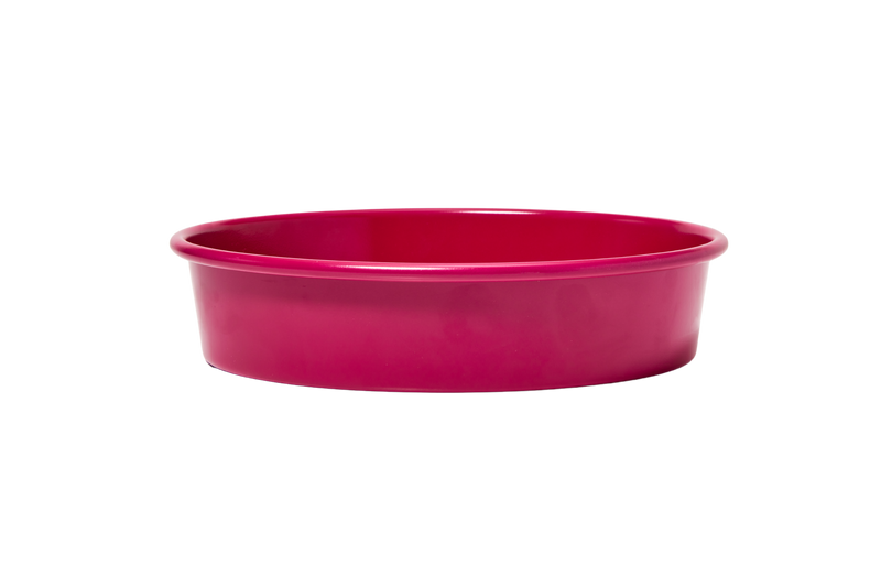 Great Jones | Patty Cake - Broccoli, a durable mixing bowl with a wavy, nonstick corrugated bottom, ideal for effortless baking and easy cleanup.