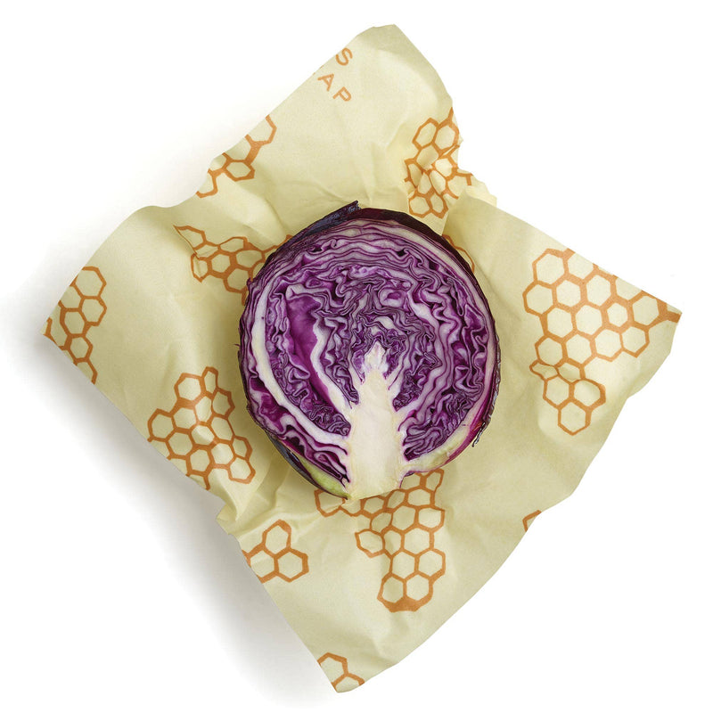 Bee's Wrap - Large 3 Pack Wraps, shown covering a cut purple cabbage, ideal for preserving kitchen items sustainably, from Athens Cooks.