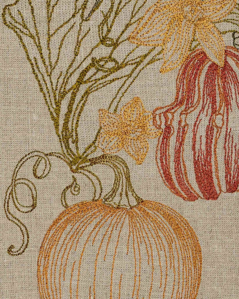 Coral & Tusk - Pumpkin Vine Tea Towel, featuring embroidered pumpkins and vines, perfect for kitchen decor. Measures 25 × 18 unfolded.