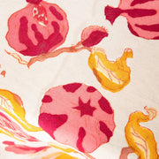 Couleur Nature - Pomegranate Yellow & Red tablecloth with a vibrant fruit motif on cotton, designed by Bruno Lamy, perfect for enhancing any dining space.