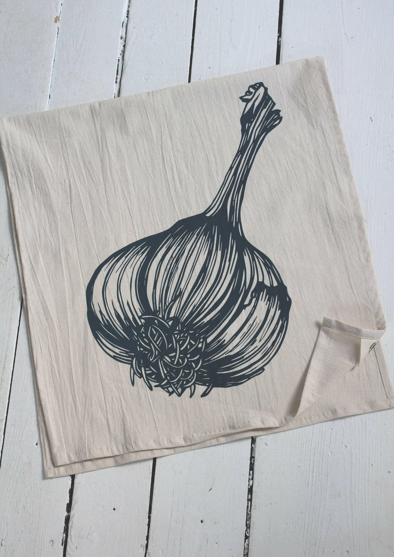 Hearth and Harrow organic cotton tea towel featuring a hand-printed garlic design, perfect for kitchen use. Eco-friendly and stylish, ideal for any cooking enthusiast.
