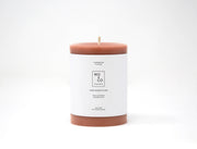 Mo&Co Home - 100% Beeswax Pillar Candle in Terra Cotta, 3x4 Inch, with a white label, hand-poured for a clean, eco-friendly burn.