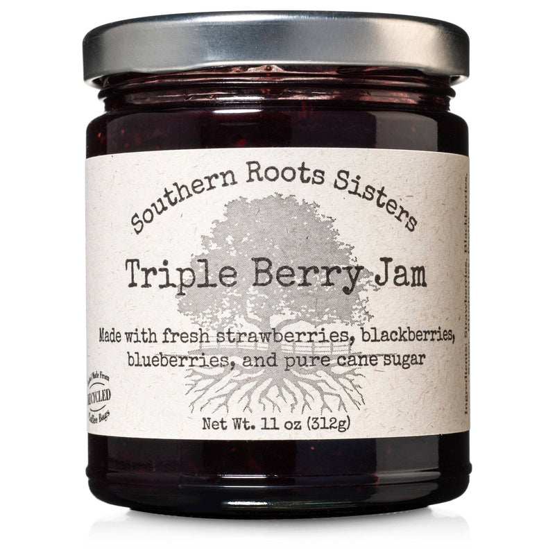 Southern Roots Sisters Triple Berry Jam in an 11 oz glass jar, featuring a blend of strawberries, blackberries, blueberries, and pure cane sugar.