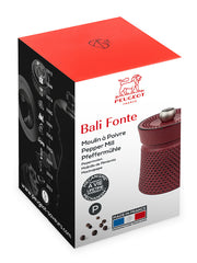 Peugeot | Bali Cast Iron Pepper Mill, Red, in packaging featuring logo, product names, lifetime guarantee badge, and Made in France label.