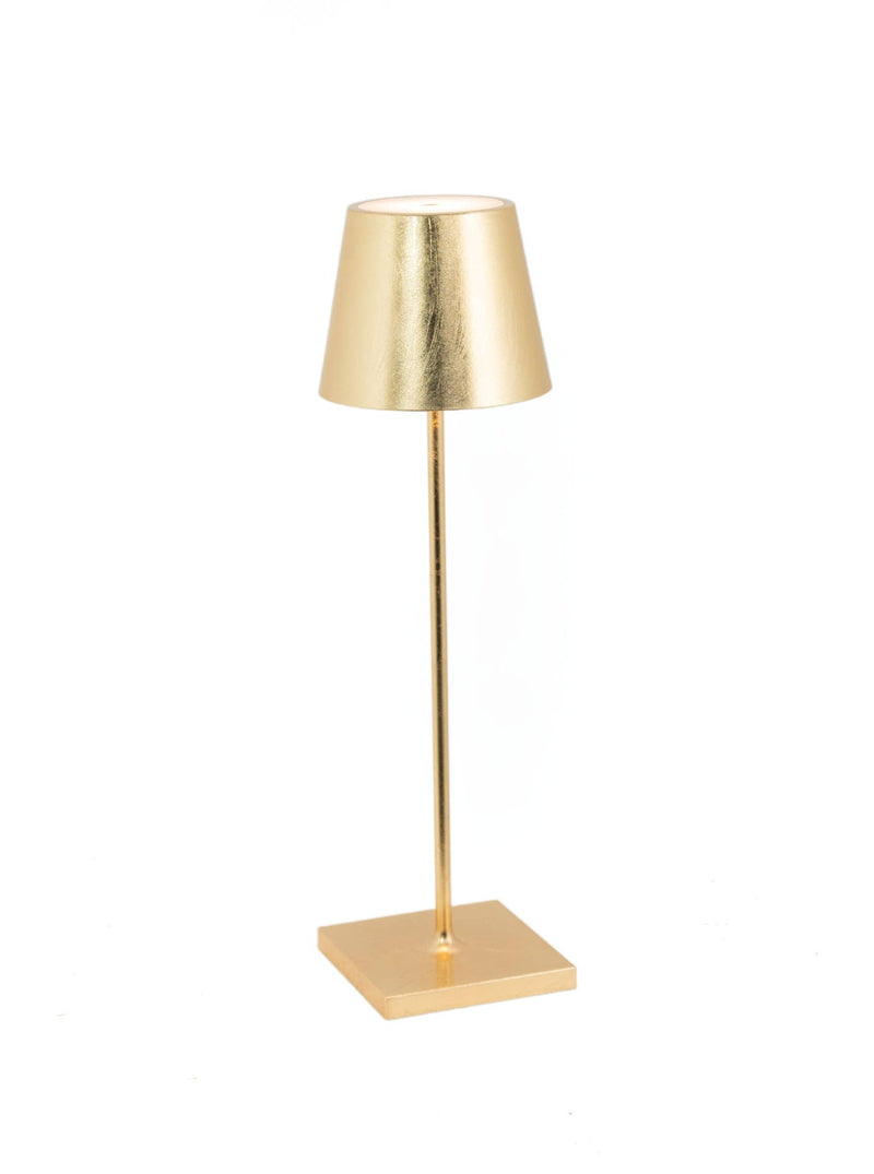 Zafferano America - Poldina Pro Cordless Lamp: A sleek gold table lamp with a square base and conical shade, perfect for modern, versatile lighting solutions.