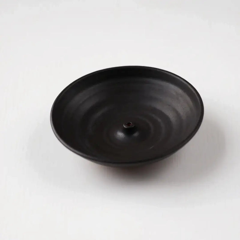 Gravesco Pottery - Incense Burner: Hand-thrown black ceramic dish with a central cone for incense, designed to catch ash, complementing your curated kitchen essentials.
