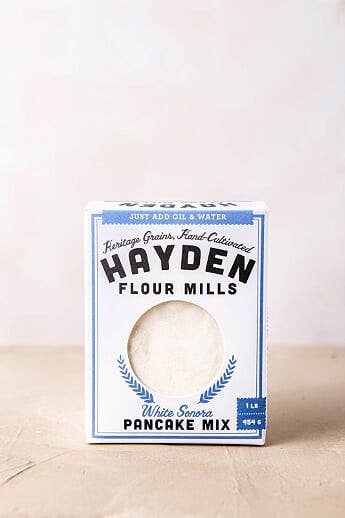 Hayden Flour Mills - White Sonora Pancake Mix in a 1 lb box, highlighting minimal ingredients for authentic flavor. Just add water and oil for delicious pancakes.