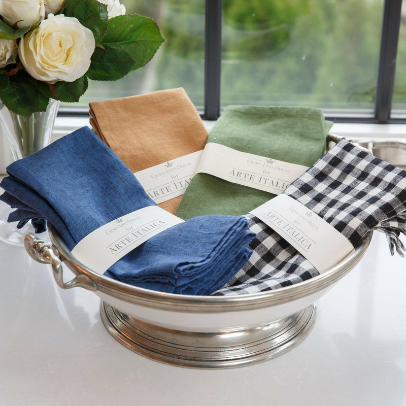 Crown Linen Designs' Harvest Gold linen napkin set elegantly displayed with a white rose, showcasing the brand's luxurious European washed linen collection.
