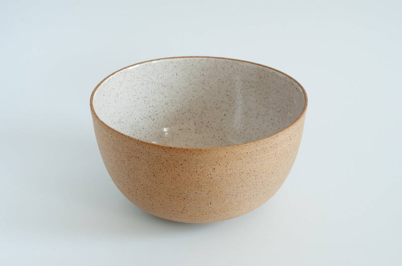 RachaelPots - Salad Serving Bowl: Nude/Sage, a hand-thrown stoneware bowl with a speckled tan exterior and off-white interior, ideal for serving 6-8 people.