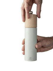 Peugeot | Boreal Salt + Pepper Mills - Sage Green Salt Mill, featuring a matte base and wooden top, showcasing elegant design and adjustable grinding for precise seasoning.