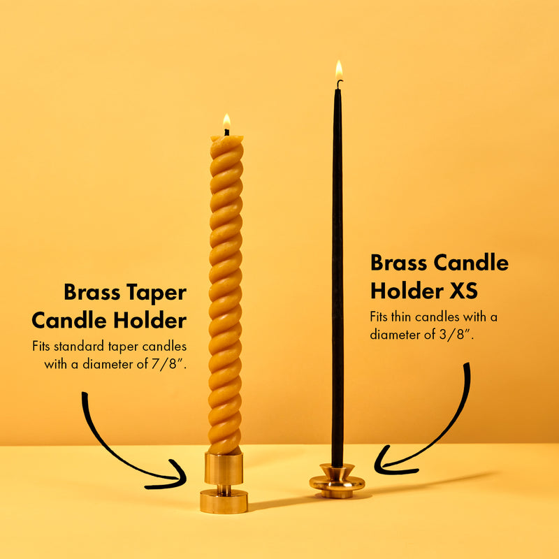54 Celsius | Solid Brass Candle Holder with a black taper candle, showcasing its elegant, sturdy design. Perfect for standard 7/8 candles.