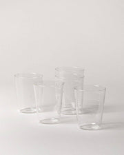 Farmhouse Pottery - Farmhouse Glasses: Set of 6 - Large, featuring five clear, borosilicate glass cups, ideal for luxurious everyday use, displayed in a minimalist style.