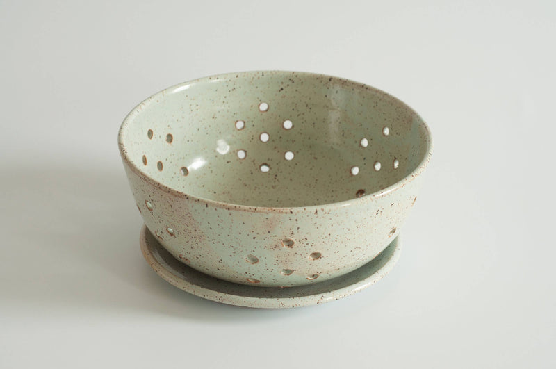 RachaelPots - Large Berry Bowl With Dish: Hand-thrown ceramic bowl with floral drainage holes and matching plate, ideal for berries or display. Handcrafted in Brooklyn.