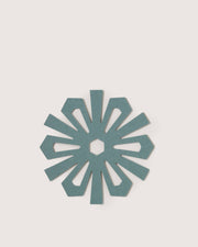 Graf Lantz - Merino Wool Snowflake Trivet - Heather Spruce, a teal felt trivet with a petal design, protects surfaces while adding elegance to your kitchen decor.