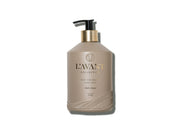 L'AVANT Collective - Hand Soap Ambre Santal: 16 fl oz taupe pump bottle with black pump, gold collar, and ribbed base, offering a refined, eco-luxe handwashing experience.