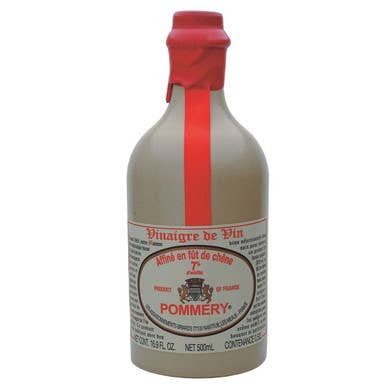 The French Farm - Pommery Red Wine Vinegar Stone Bottle 16oz, a ceramic bottle sealed with red wax, ideal for enhancing sauces and salads.