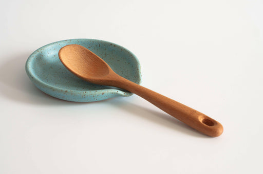 Handcrafted RachaelPots yellow spoon rest, 4.5” in diameter, made in Brooklyn, ideal for kitchen use or as a housewarming gift.