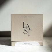 Last Candle Co - White Onyx Refillable Candle in luxury beige box with magnetic closure, featuring unique marble variations and 55-hour burn time.