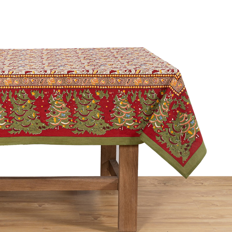 Couleur Nature - Noel Red & Green French Tablecloth showcases festive Christmas motifs on French linen, handprinted by artisans, perfect for adding charm to any holiday table setting.