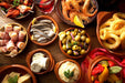 "Spanish Tapas + Wine Flights" with Chef Alejandro Ortiz of PINTA, Friday, June 21, 6:00pm-8:00pm.