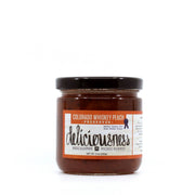 RedCamper - Colo. Whiskey Peach Deliciousness Preserves, 9 oz jar, perfect for cheeseboards and pairing with various foods, showcasing organic peaches and award-winning flavor.