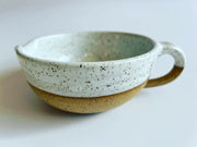 RachaelPots | Salad Dressing Bowl - Nude: Hand-thrown multi-use bowl with garlic scraper, handle, and spout, ideal for dressings or guacamole, crafted in Brooklyn.
