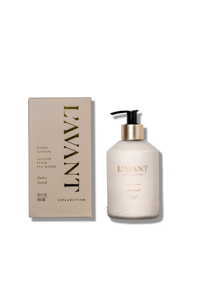 L'AVANT Collective - Hand Lotion Ambre Santal set, featuring a frosted-glass pump bottle and matching box, offering a luxurious, plant-based moisturizing experience.