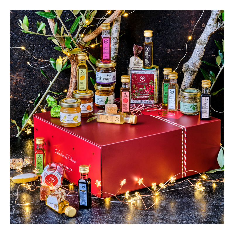 Oliviers&Co | Christmas Advent Calendar with mini bottles, jars, confections, and decorative olive branches, styled as a festive gourmet gift set.