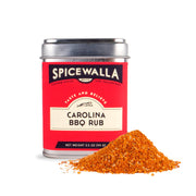 Spicewalla | Carolina BBQ Rub tin with a mound of seasoning, perfect for enhancing pork and poultry dishes with its smokey, spicy, sweet flavors.