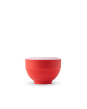 W&P - Standard Size Popcorn Popper, a red silicone bowl with a plastic lid, ideal for making microwave popcorn, collapsible for easy storage.