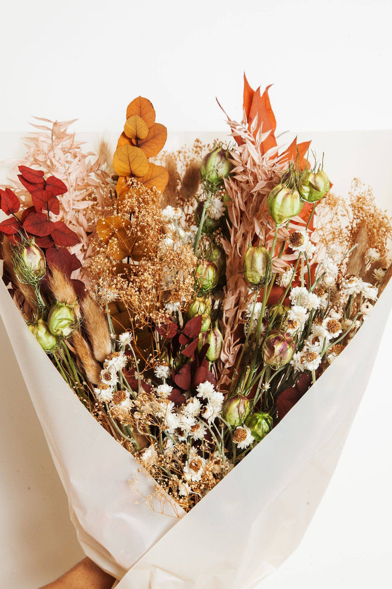 Idlewild Floral Co. - Fall Dried Flower Bouquet, featuring strawflowers, pampas, baby’s breath, and eucalyptus, wrapped elegantly in paper, perfect for autumn decor or gifting.