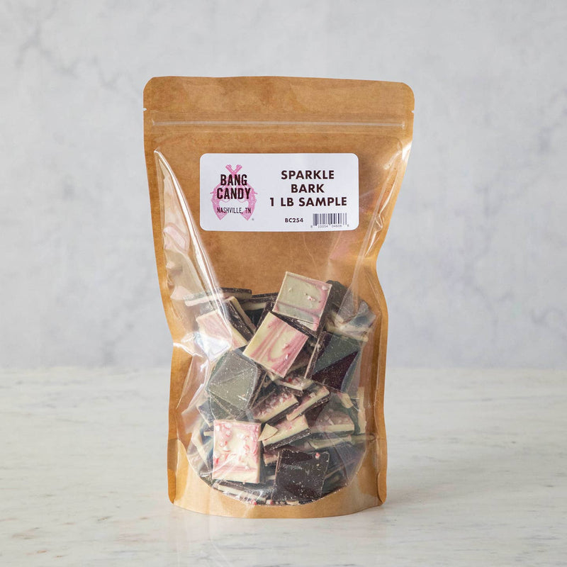 Hester & Cook | Sparkle Bark - Sample Bag: One-pound resealable pouch featuring bite-sized chocolate bark swirled with white, pink, and dark chocolate.