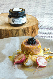 TartufLanghe - Truffle Perlage – Caviar-Style Pearls elegantly presented on a gourmet appetizer with roasted vegetables, highlighting its innovative culinary appeal.