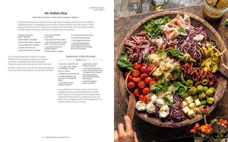 The Italian Chop salad from 'Half Baked Harvest Quick & Coz' cookbook, featuring vibrant ingredients and homemade dressing, ready to serve in a wooden bowl.