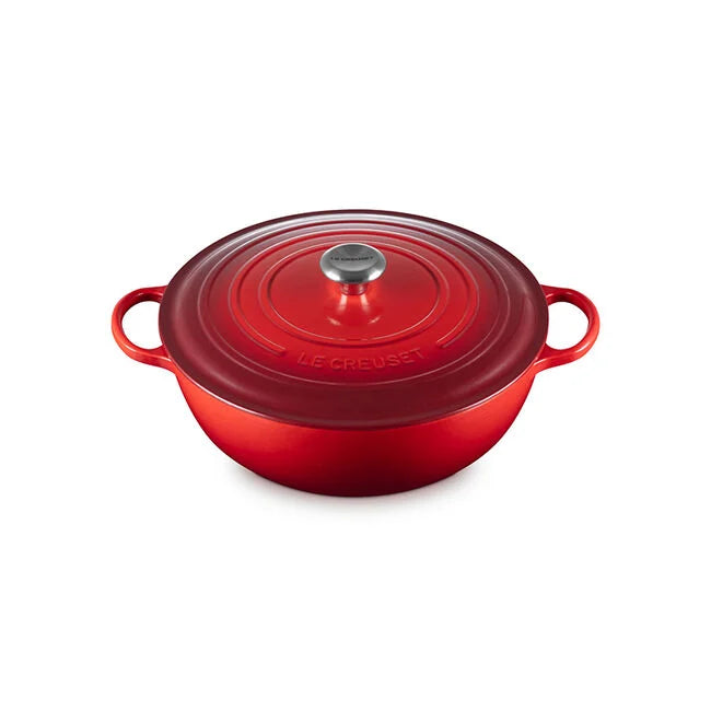 Le Creuset Signature Chef’s Oven, enameled cast-iron braiser with matching lid and side handles, designed for versatile cooking and efficient stirring.