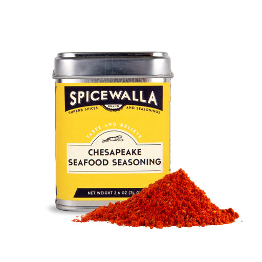 Spicewalla | Chesapeake Seafood Seasoning tin with a reddish-orange seasoning mound, ideal for enhancing seafood dishes, homemade chips, or savory cocktails.